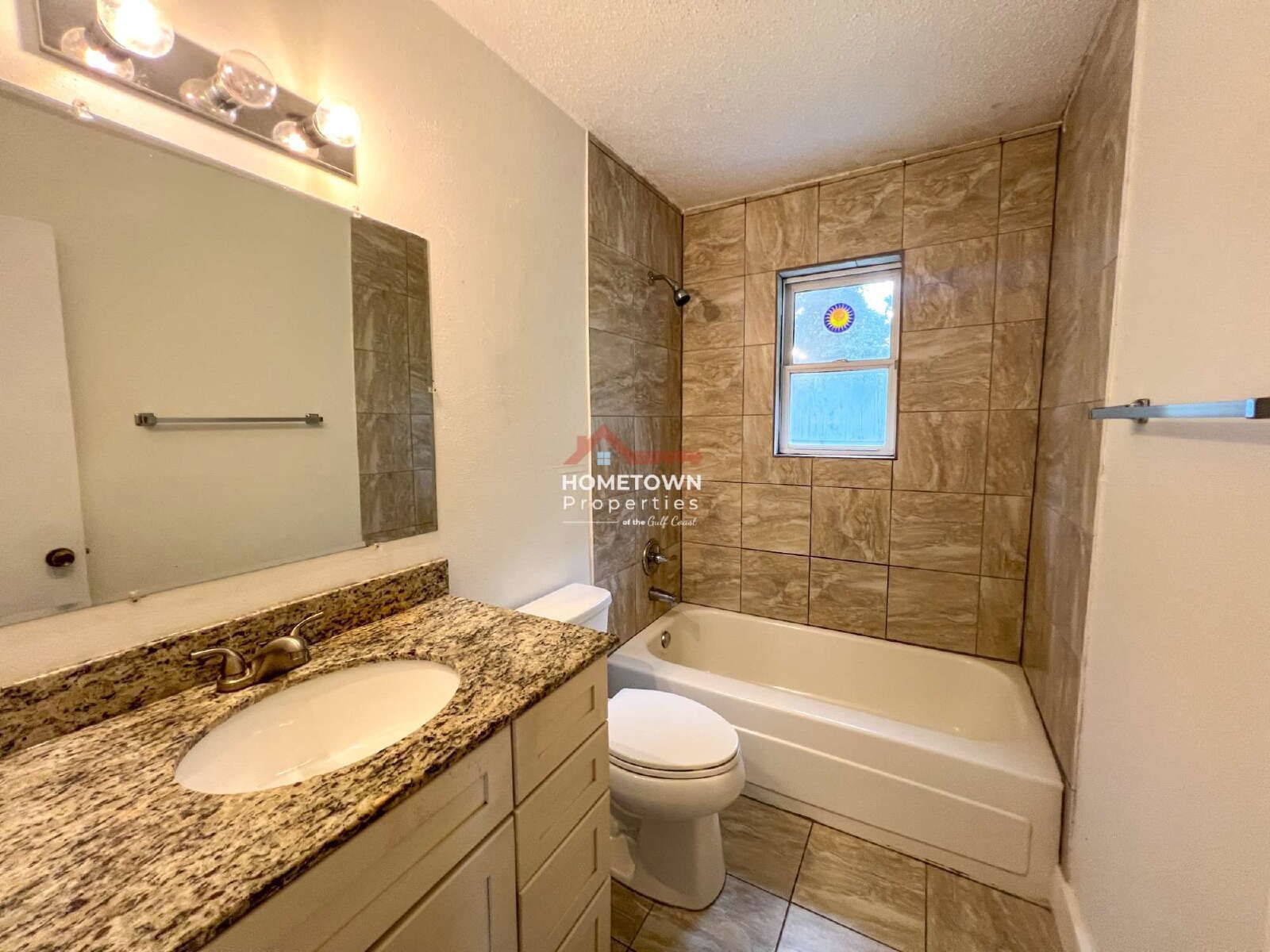 Charming 3-Bed, 2-Bath Home with Hardwood Floors property image