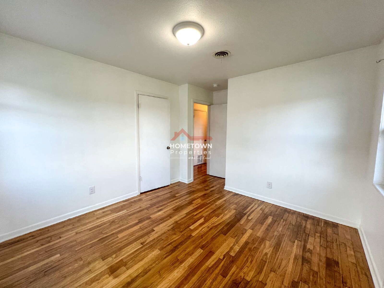 Charming 3-Bed, 2-Bath Home with Hardwood Floors property image