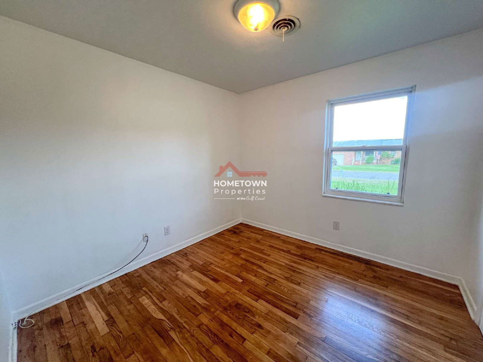 Charming 3-Bed, 2-Bath Home with Hardwood Floors property image